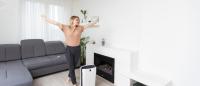 woman in her home with air purifier